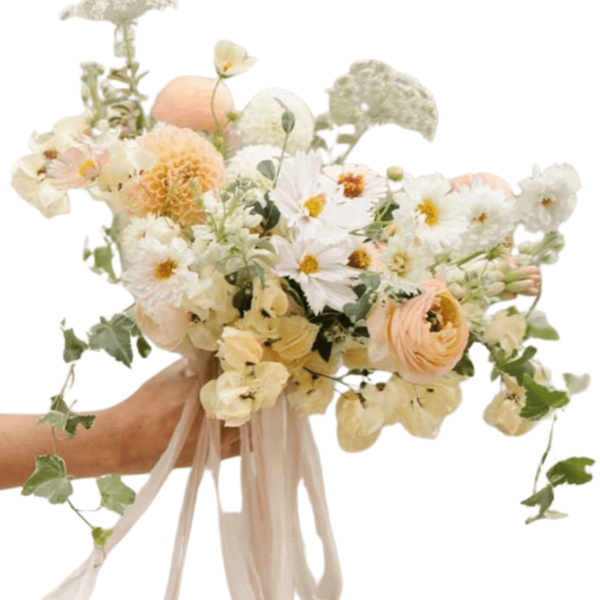 Cream and peach bridal bouquet with seasonal blooms